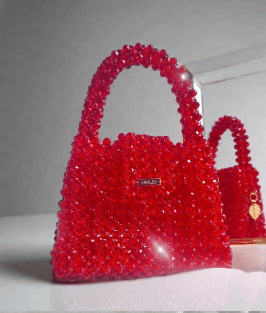 The queen of colors - RED -  A perfect match to all your dates Red Crystal Mini Handbag Size: 14*11*8cm Sling: Golden Sling chain Lining: No Lining Crystal: Glass Available on pre-order basis - 4 business days making time The queen of colors - RED A perfect match to all your dates Red Crystal Mini Handbag Size: 14*11*8cm Sling: Golden Sling chain Lining: No Lining Crystal: Glass Available on pre-order basis - 4 business days making time