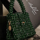 Green Nano Crystal Bag -  Made on pre-order basis (3-4 making days) Nano crystal bag - Green Size : 12*10*8cm Crystal : Glass Sling : Yes Does not fit phone Available without the brand tag* Green Nano Crystal Bag Made on pre-order basis (3-4 making days) Nano crystal bag - Green Size : 12*10*8cm Crystal : Glass Sling : Yes Does not fit phone Available without the brand tag*