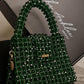 Green Nano Crystal Bag -  Made on pre-order basis (3-4 making days) Nano crystal bag - Green Size : 12*10*8cm Crystal : Glass Sling : Yes Does not fit phone Available without the brand tag* Green Nano Crystal Bag Made on pre-order basis (3-4 making days) Nano crystal bag - Green Size : 12*10*8cm Crystal : Glass Sling : Yes Does not fit phone Available without the brand tag*