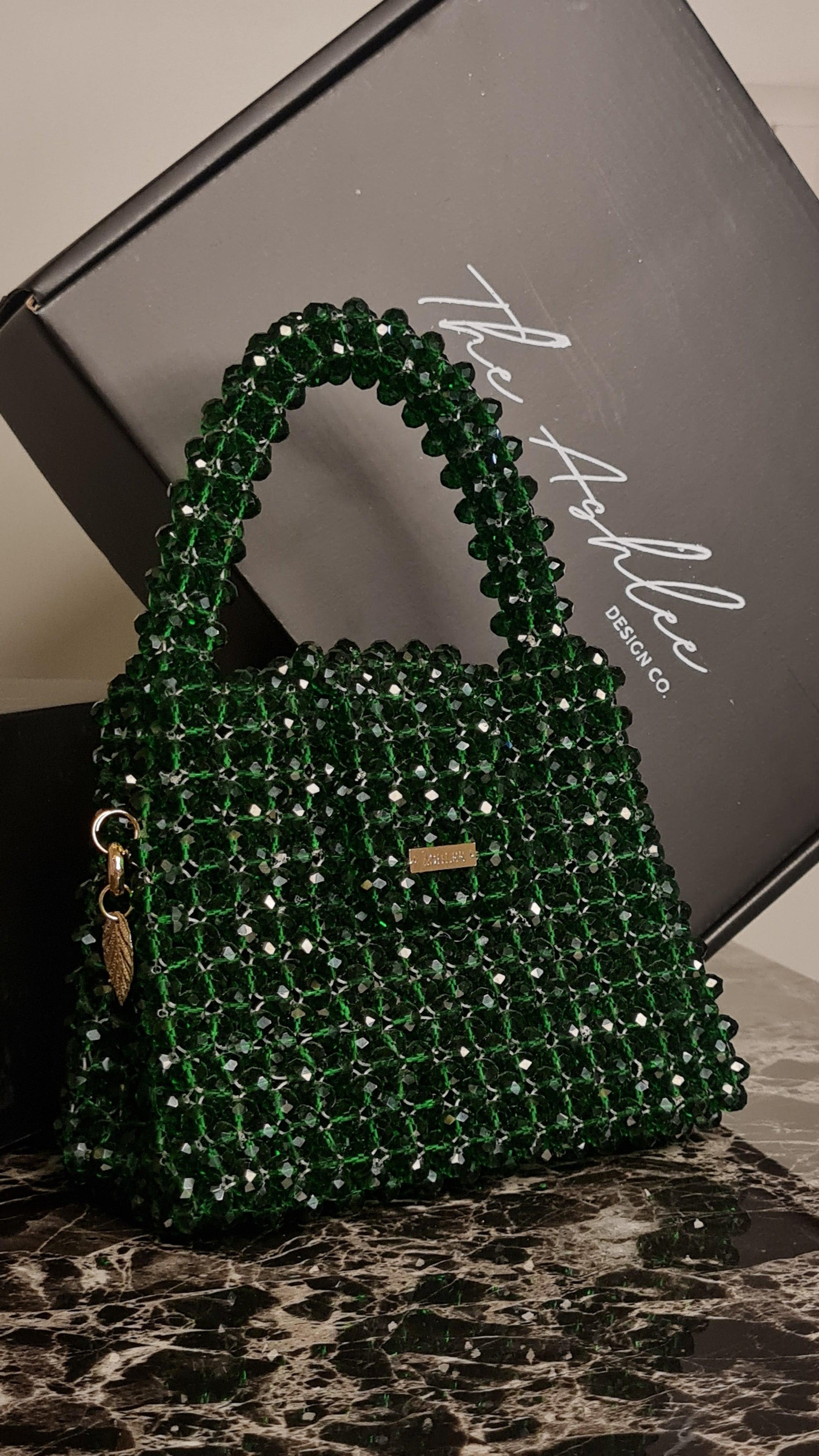 Green Nano Crystal Bag -  Made on pre-order basis (3-4 making days) Nano crystal bag - Green Size : 12*10*8cm Crystal : Glass Sling : Yes Does not fit phone Available without the brand tag* Green Nano Crystal Bag Made on pre-order basis (3-4 making days) Nano crystal bag - Green Size : 12*10*8cm Crystal : Glass Sling : Yes Does not fit phone Available without the brand tag*