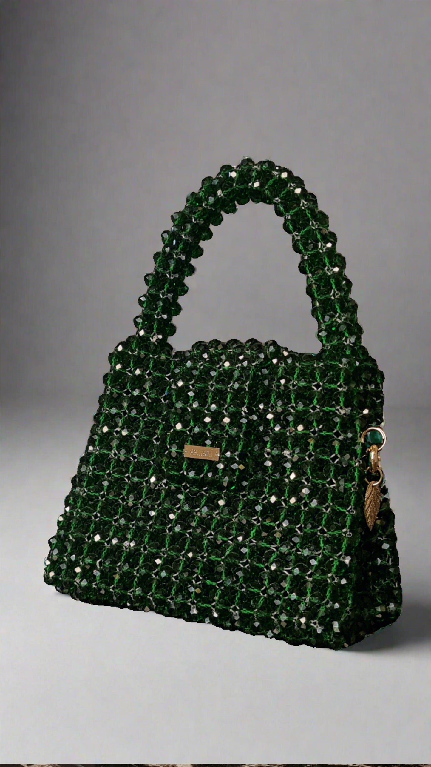 Green Nano Crystal Bag -  Made on pre-order basis (3-4 making days) Nano crystal bag - Green Size : 12*10*8cm Crystal : Glass Sling : Yes Does not fit phone Available without the brand tag* Green Nano Crystal Bag Made on pre-order basis (3-4 making days) Nano crystal bag - Green Size : 12*10*8cm Crystal : Glass Sling : Yes Does not fit phone Available without the brand tag*