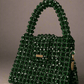 Green Nano Crystal Bag -  Made on pre-order basis (3-4 making days) Nano crystal bag - Green Size : 12*10*8cm Crystal : Glass Sling : Yes Does not fit phone Available without the brand tag* Green Nano Crystal Bag Made on pre-order basis (3-4 making days) Nano crystal bag - Green Size : 12*10*8cm Crystal : Glass Sling : Yes Does not fit phone Available without the brand tag*