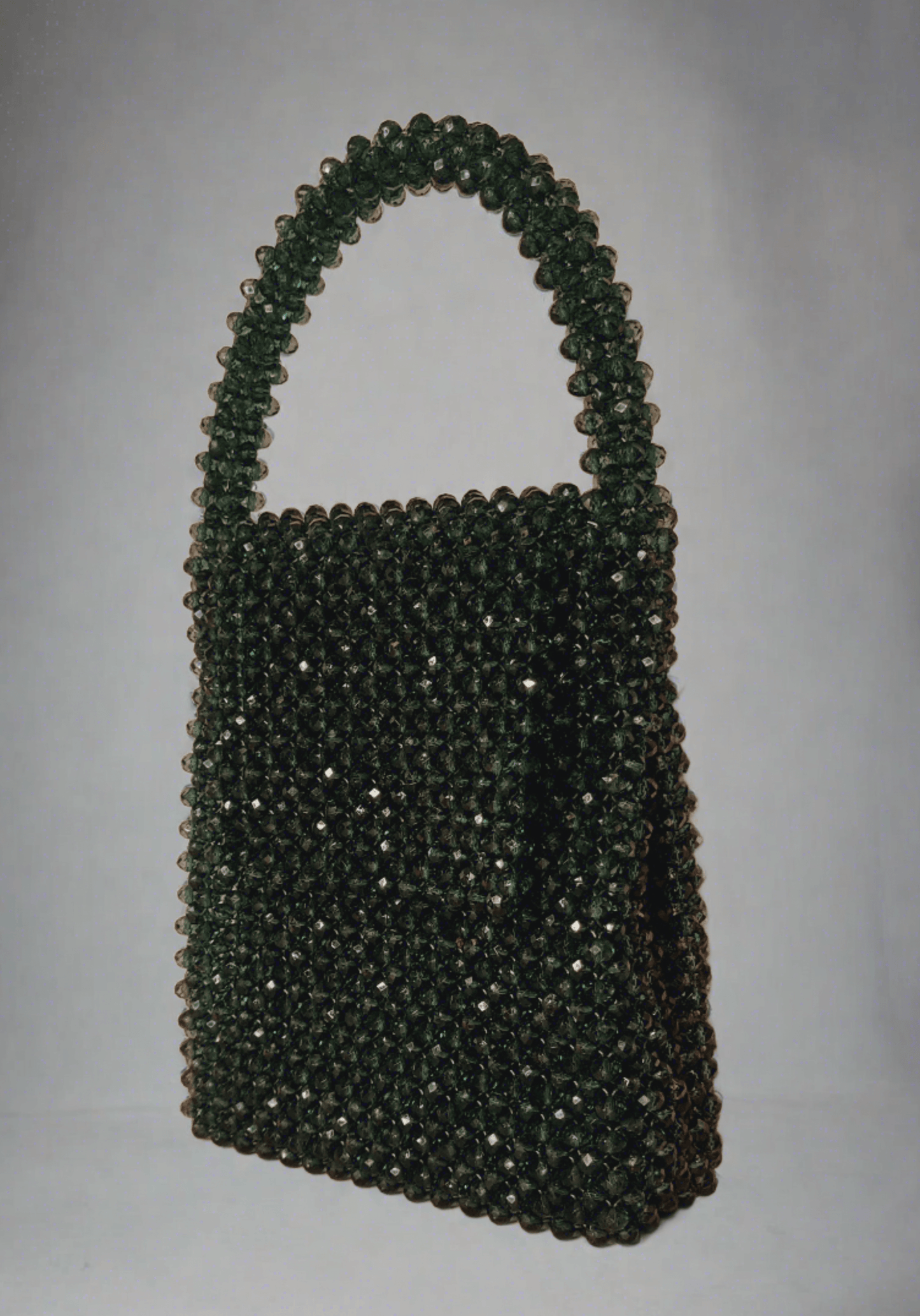 A Sparkly green handbag