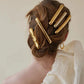 Curvy metal art hair clip