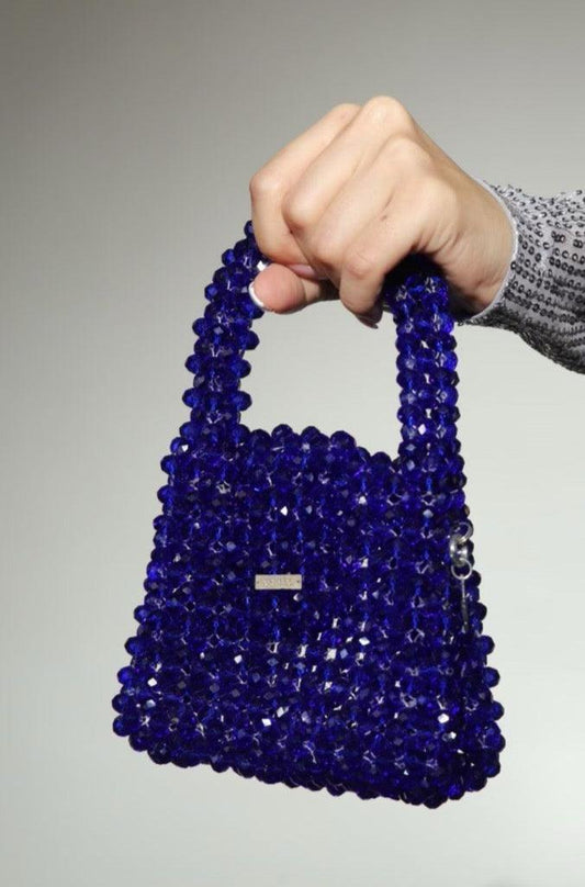 The Royal Blue -  A perfect match to all your dates Glass Crystal Mini Handbag Size: 14*11*8cm Sling: Golden Sling chain Lining: No Lining Crystal: Glass The Royal Blue A perfect match to all your dates Glass Crystal Mini Handbag Size: 14*11*8cm Sling: Golden Sling chain Lining: No Lining Crystal: Glass