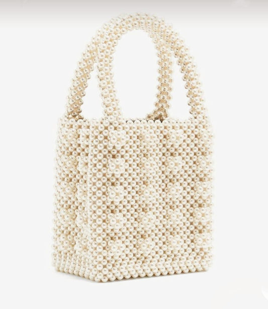 Pearl Bag - Off white -  Color : off white Luxe Pearl Lining: Yes, same as pearl color Sling: No Size: 6*6*3 inches Pearl Bag - Off white Color : off white Luxe Pearl Lining: Yes, same as pearl color Sling: No Size: 6*6*3 inches