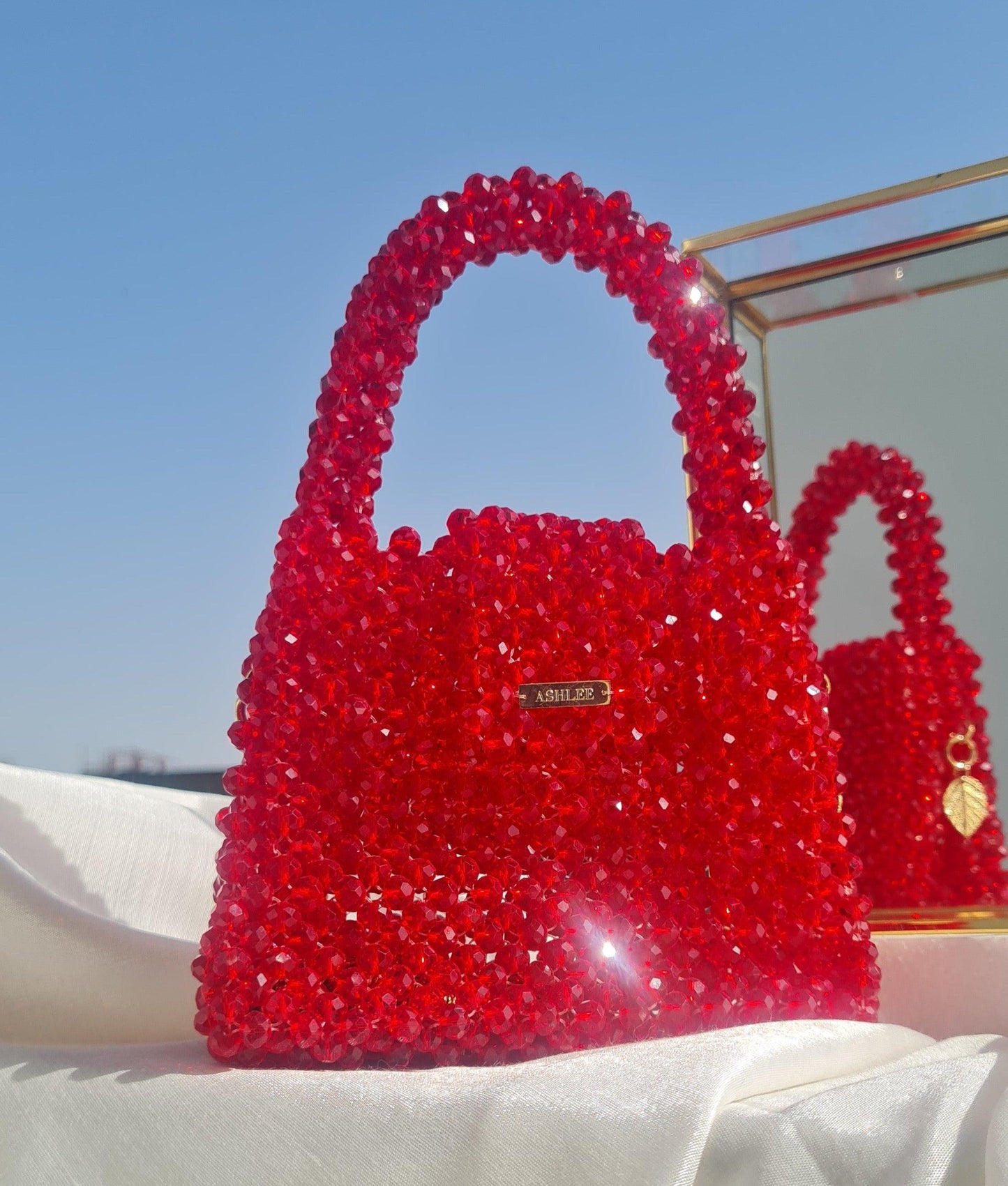 The queen of colors - RED -  A perfect match to all your dates Red Crystal Mini Handbag Size: 14*11*8cm Sling: Golden Sling chain Lining: No Lining Crystal: Glass Available on pre-order basis - 4 business days making time The queen of colors - RED A perfect match to all your dates Red Crystal Mini Handbag Size: 14*11*8cm Sling: Golden Sling chain Lining: No Lining Crystal: Glass Available on pre-order basis - 4 business days making time