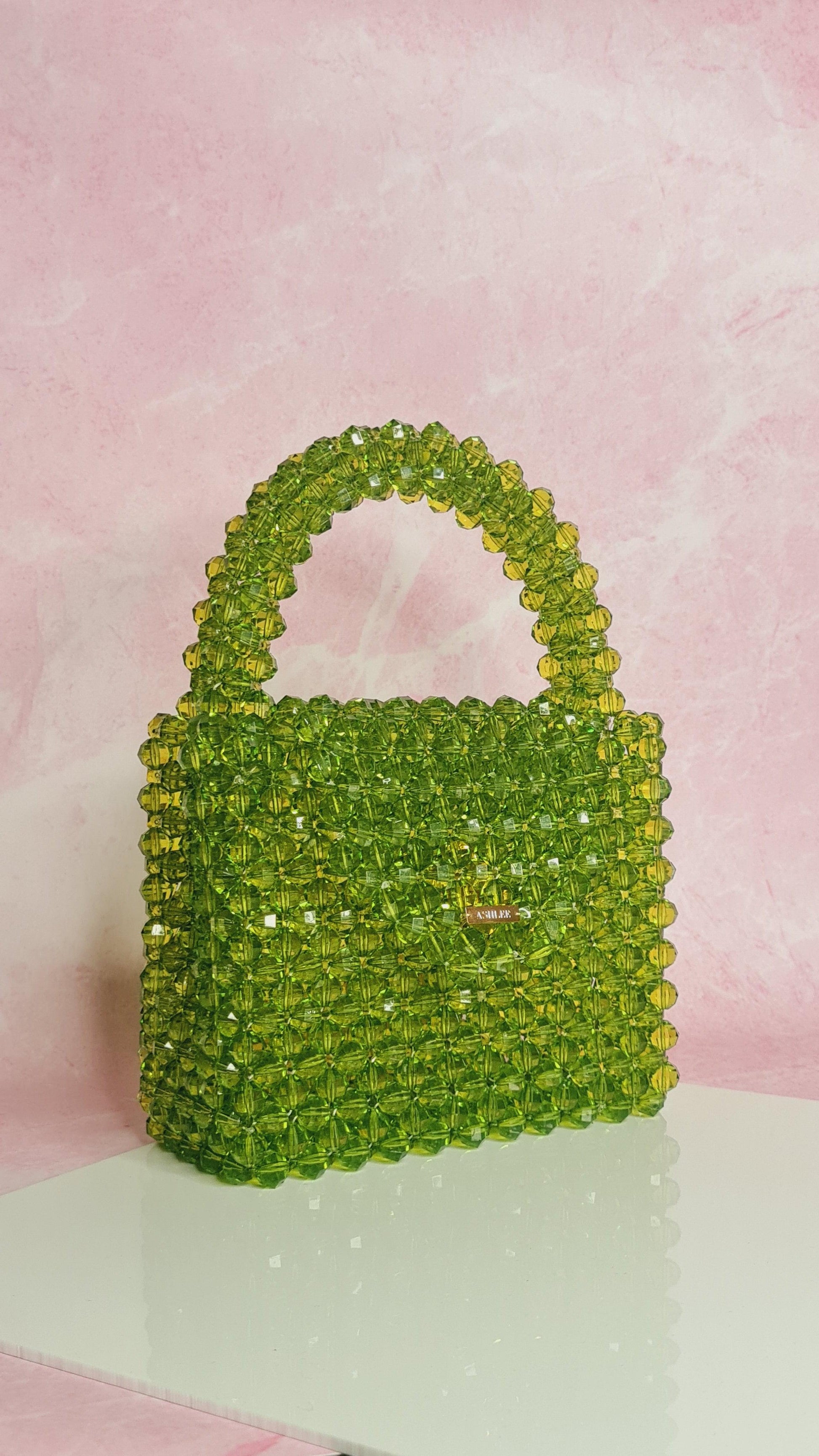 Green Pop up -  Lime Green Crystal bag Size: 6*6*3 inches Sling: No Material : Arcylic & Glass mix Available on pre-order basis - 4 business days making time Green Pop up Lime Green Crystal bag Size: 6*6*3 inches Sling: No Material : Arcylic & Glass mix Available on pre-order basis - 4 business days making time