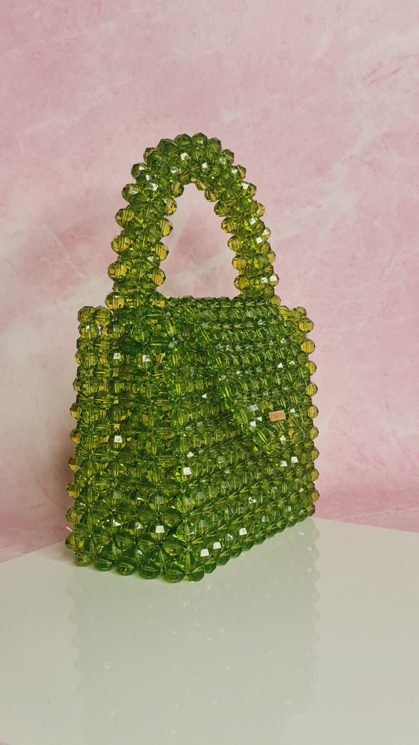 Green Pop up -  Lime Green Crystal bag Size: 6*6*3 inches Sling: No Material : Arcylic & Glass mix Available on pre-order basis - 4 business days making time Green Pop up Lime Green Crystal bag Size: 6*6*3 inches Sling: No Material : Arcylic & Glass mix Available on pre-order basis - 4 business days making time