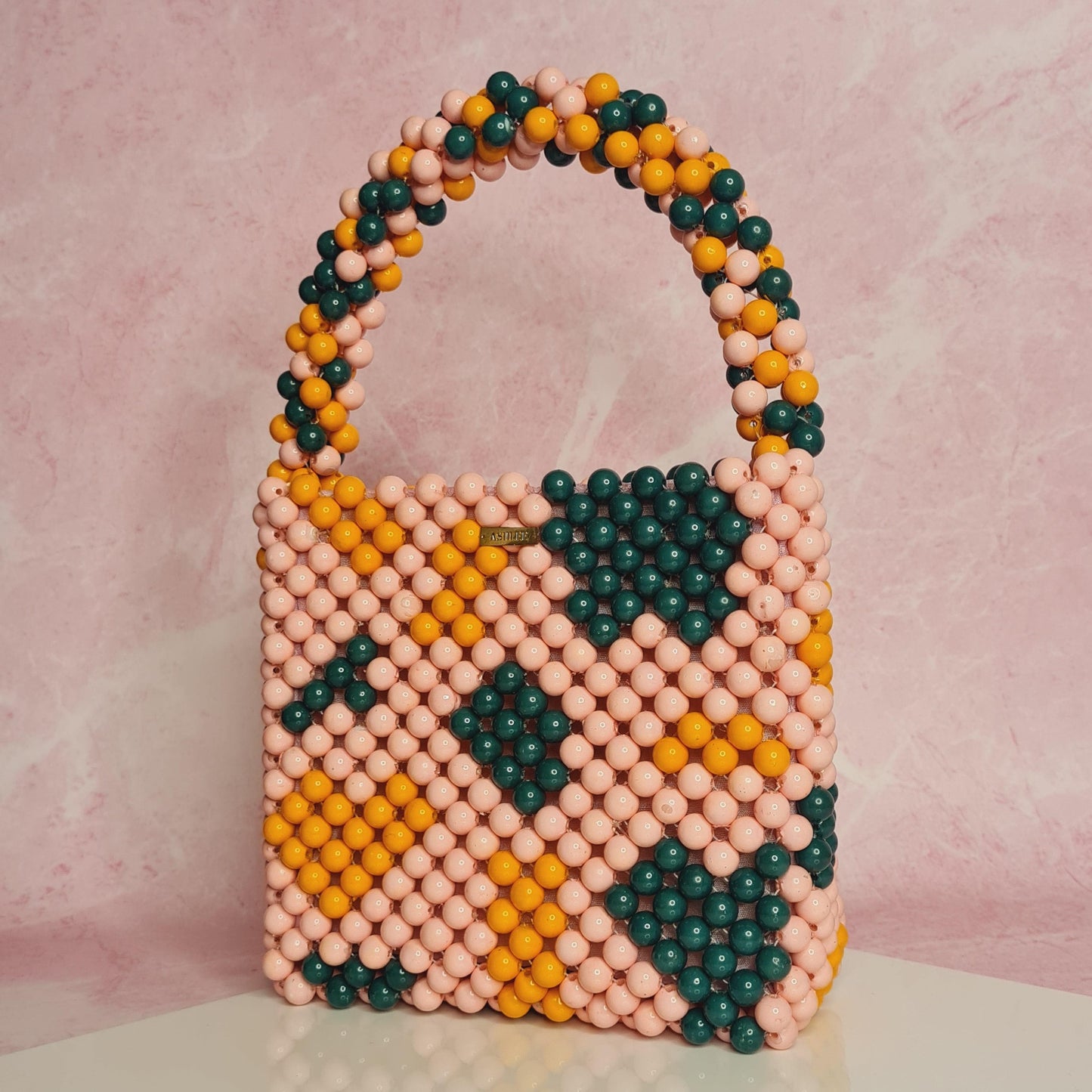 Summer Pearl color pop -  Summer Bag - Pearl color pop Pattern mix : Yellow, Pink and Green pearls Size : 6*6*3 inches Summer Pearl color pop Summer Bag - Pearl color pop Pattern mix : Yellow, Pink and Green pearls Size : 6*6*3 inches