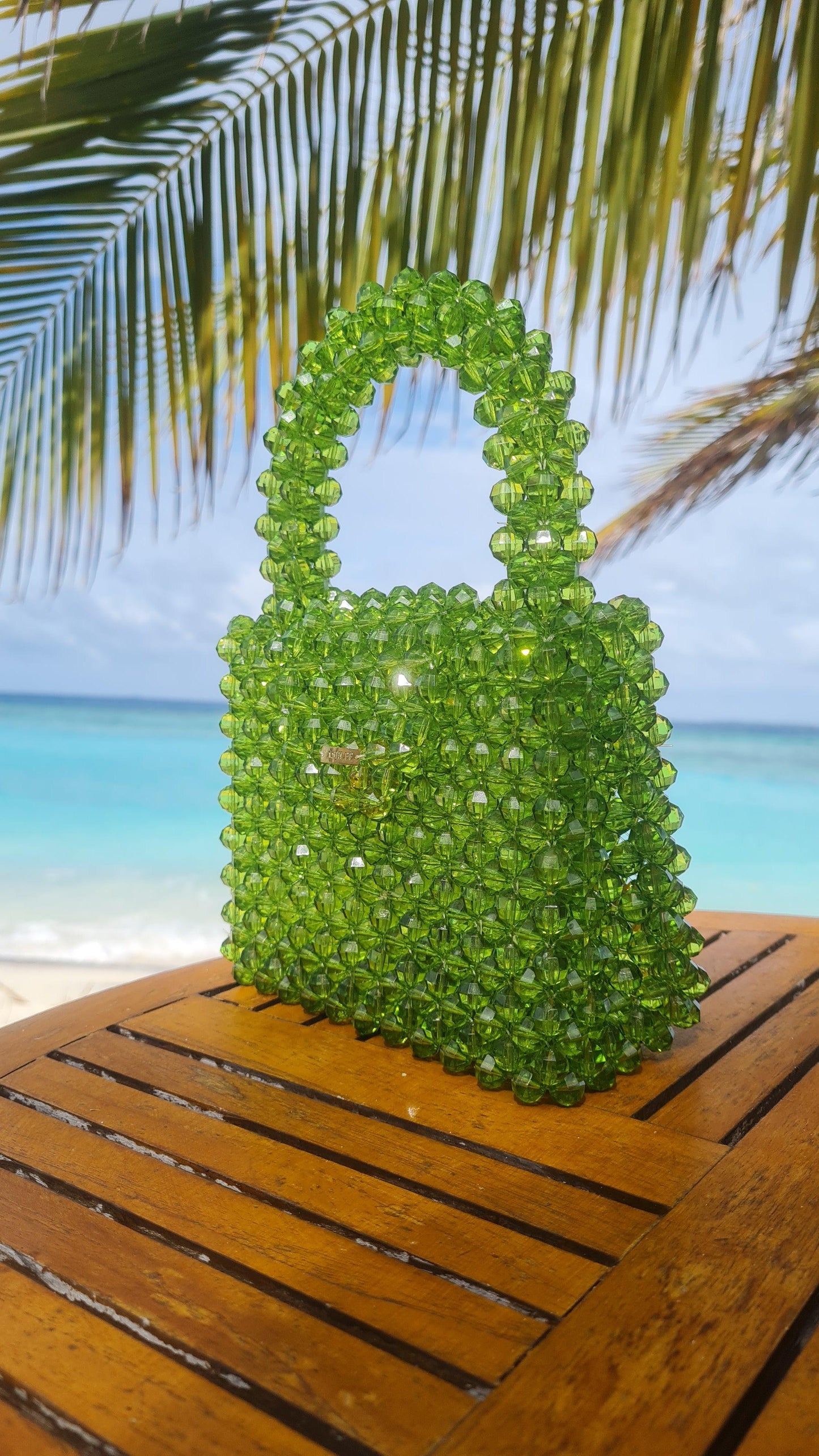 Green Pop up -  Lime Green Crystal bag Size: 6*6*3 inches Sling: No Material : Arcylic & Glass mix Available on pre-order basis - 4 business days making time Green Pop up Lime Green Crystal bag Size: 6*6*3 inches Sling: No Material : Arcylic & Glass mix Available on pre-order basis - 4 business days making time