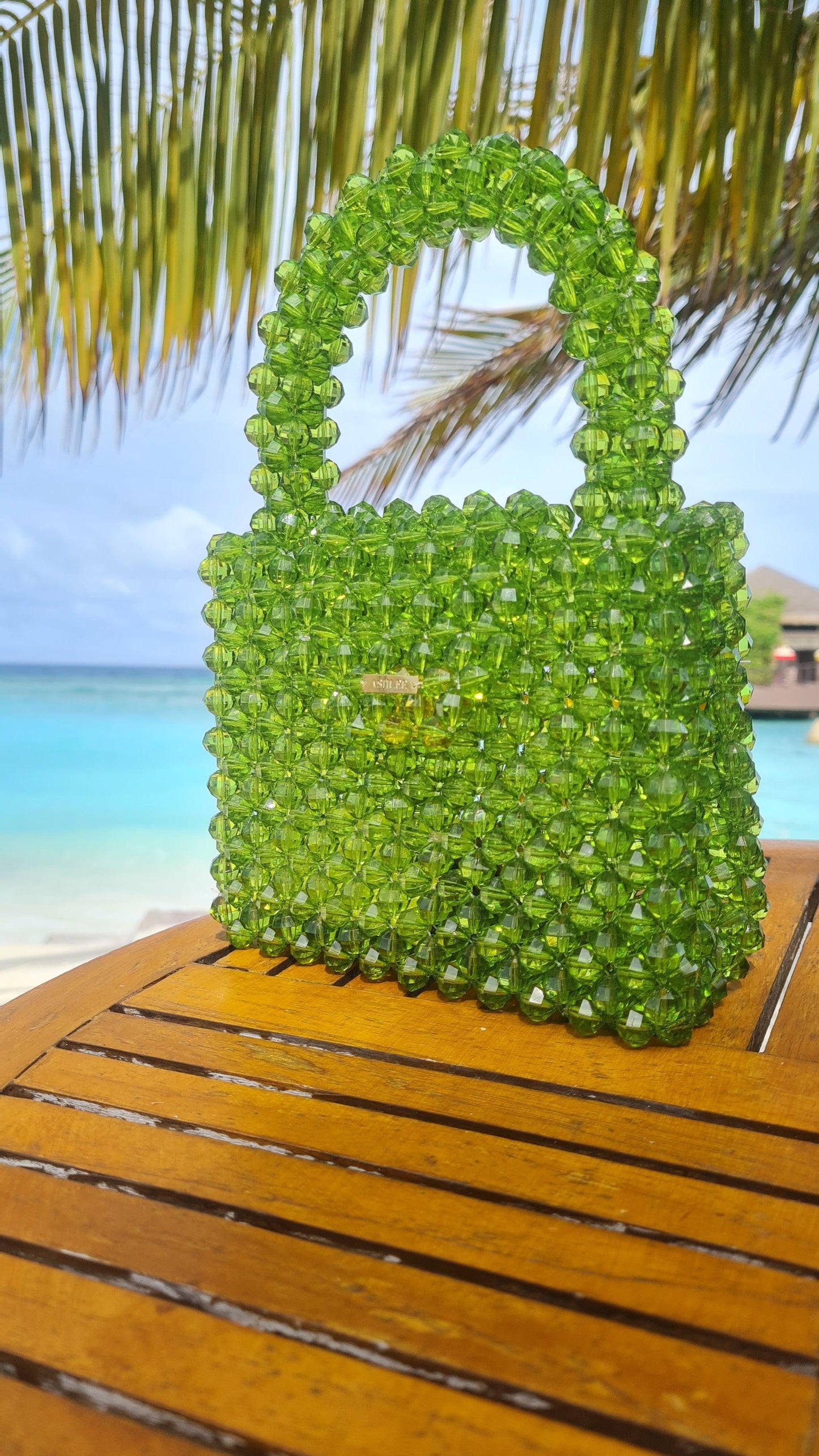 Green Pop up -  Lime Green Crystal bag Size: 6*6*3 inches Sling: No Material : Arcylic & Glass mix Available on pre-order basis - 4 business days making time Green Pop up Lime Green Crystal bag Size: 6*6*3 inches Sling: No Material : Arcylic & Glass mix Available on pre-order basis - 4 business days making time