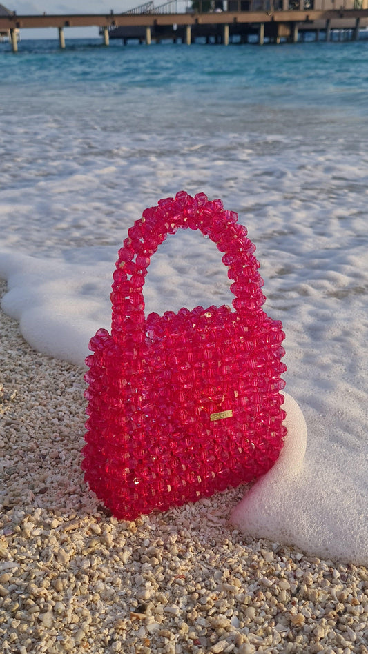 The Pink Grapefruit Handbag -  Size: 6*6*3 inches Sling: No Material : Arcylic & Glass mix Available on pre-order basis - 4 business days making time The Pink Grapefruit Handbag Size: 6*6*3 inches Sling: No Material : Arcylic & Glass mix Available on pre-order basis - 4 business days making time