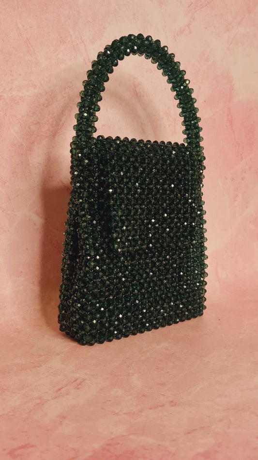 A Sparkly green handbag