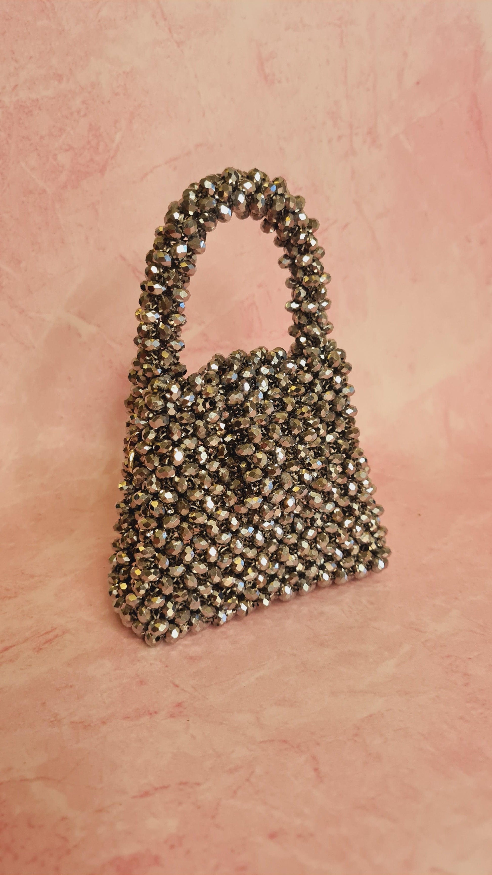 Silver crystal bag -  A perfect match to all your dates Macro silver Crystal Handbag Size: 14*12*8cm Sling: silver Sling chain Lining: No Lining Crystal: Glass Available on pre-order basis - 4 business days making time Silver crystal bag A perfect match to all your dates Macro silver Crystal Handbag Size: 14*12*8cm Sling: silver Sling chain Lining: No Lining Crystal: Glass Available on pre-order basis - 4 business days making time