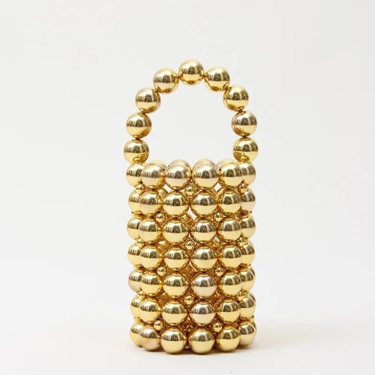 Gold Bling -  A perfect match for all your dates Gold Pearl Mini Handbag Sling: No sling Lining: Pouch Available on pre-order basis - 3 business days making time Gold Bling A perfect match for all your dates Gold Pearl Mini Handbag Sling: No sling Lining: Pouch Available on pre-order basis - 3 business days making time