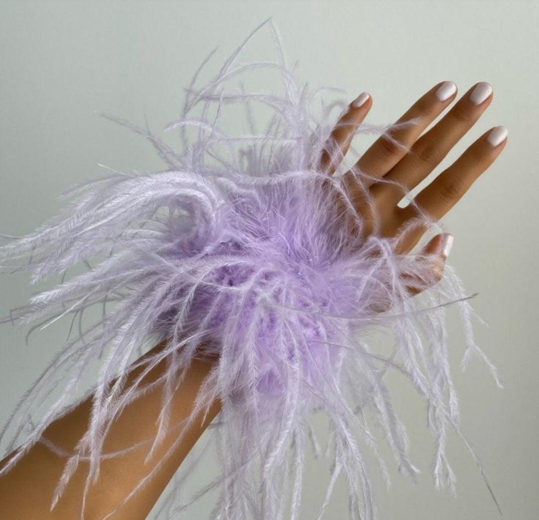 Detachable Feather Band - Lavendar -  Detachable high density Ostrich feather band adjustable to the wrist - Pair of 2 in each set Color: Lavender Available on pre-order basis - 4 business days making time Detachable Feather Band - Lavendar Detachable high density Ostrich feather band adjustable to the wrist - Pair of 2 in each set Color: Lavender Available on pre-order basis - 4 business days making time