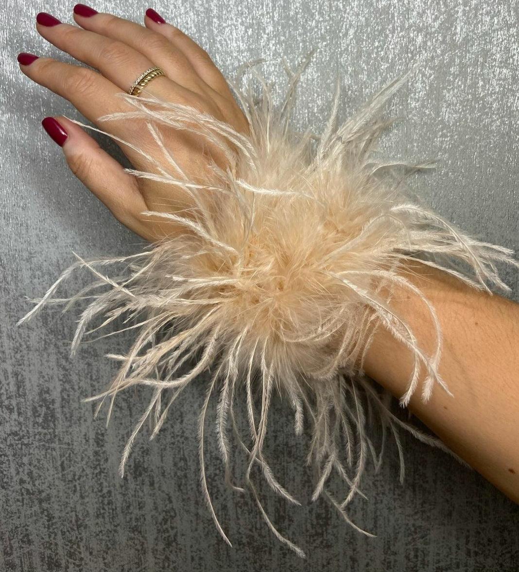 Detachable Feather Band - Beije -  Detachable high density Ostrich feather band adjustable to the wrist - Pair of 2 in each set Color: Beije Available on pre-order basis - 4 business days making time Detachable Feather Band - Beije Detachable high density Ostrich feather band adjustable to the wrist - Pair of 2 in each set Color: Beije Available on pre-order basis - 4 business days making time