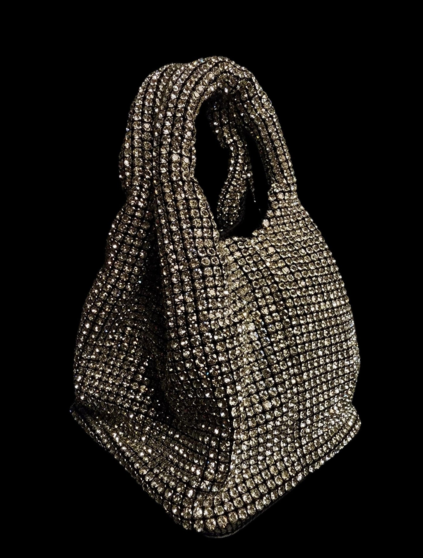 Silver Rhinestone Bag -  Silver Rhinestone bag Material : Rhinestone with black premium lining inside Sling : detachable chain It can fit a phone and other necessities easily Only 1 left in stock Silver Rhinestone Bag Silver Rhinestone bag Material : Rhinestone with black premium lining inside Sling : detachable chain It can fit a phone and other necessities easily Only 1 left in stock