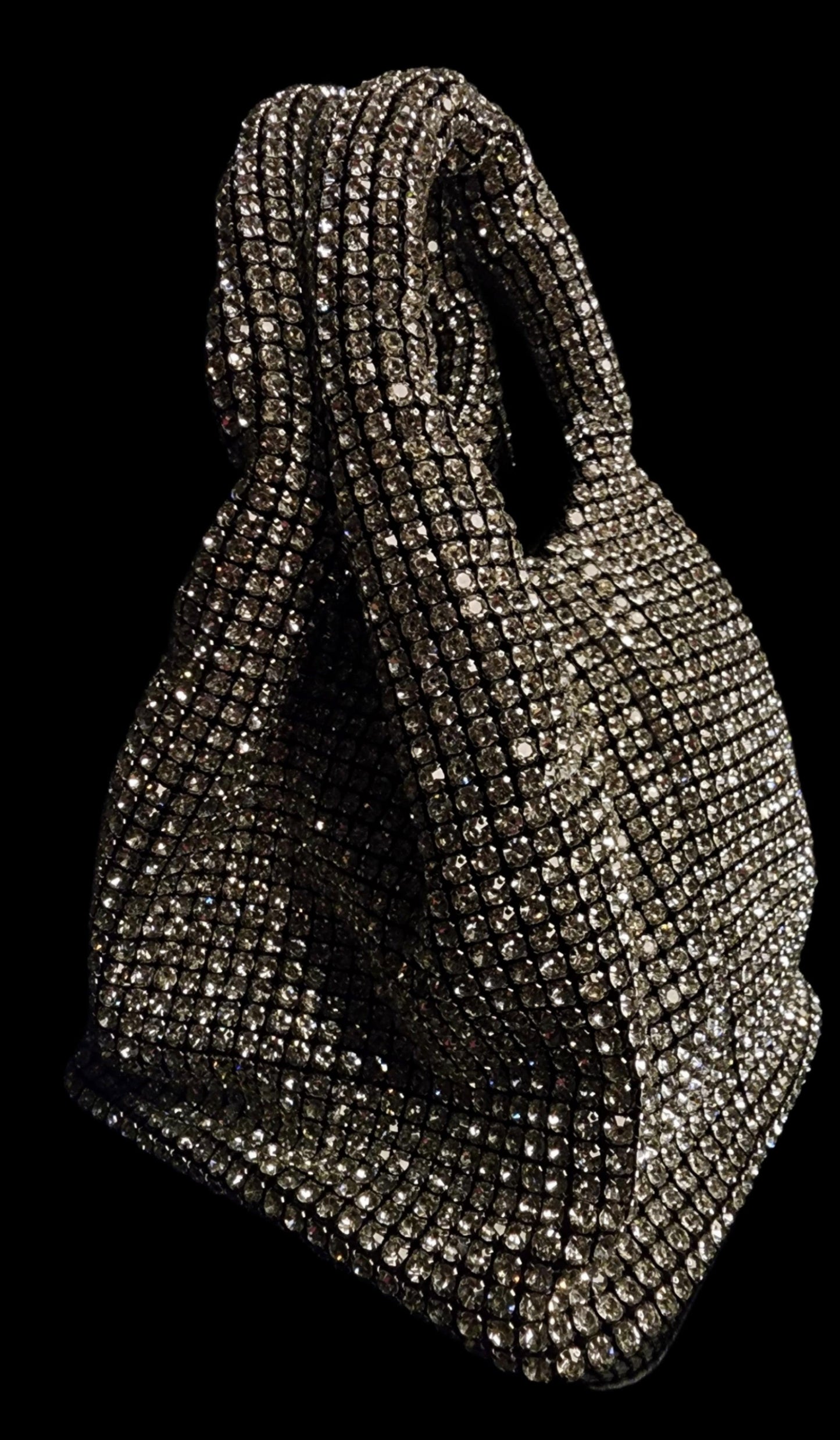 Silver Rhinestone Bag -  Silver Rhinestone bag Material : Rhinestone with black premium lining inside Sling : detachable chain It can fit a phone and other necessities easily Only 1 left in stock Silver Rhinestone Bag Silver Rhinestone bag Material : Rhinestone with black premium lining inside Sling : detachable chain It can fit a phone and other necessities easily Only 1 left in stock